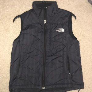 Small north face vest only worn a couple times